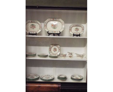 A selection of Copeland Spode Chinese Rose dinner ware to include meat plates, dinner plates, bowls and sauce boat