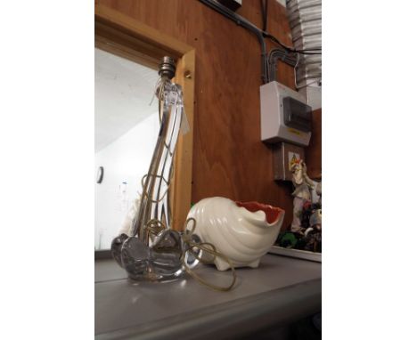 A glass table lamp together with a Poole pottery shell