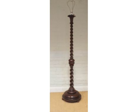 A 1920's oak barley twist lamp standard   Height approx. 63.5” excluding the shade 