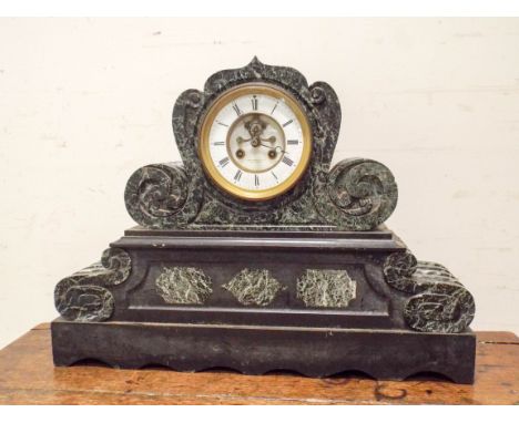 A large French striking mantle clock in green and mottled marble case 231/2" wide 17" tall 