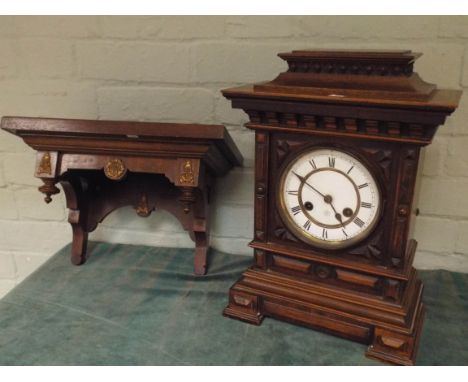 An Edwardian striking bracket clock in walnut case complete with wall fixing bracket, the clock is 111/2" wide 16" high 