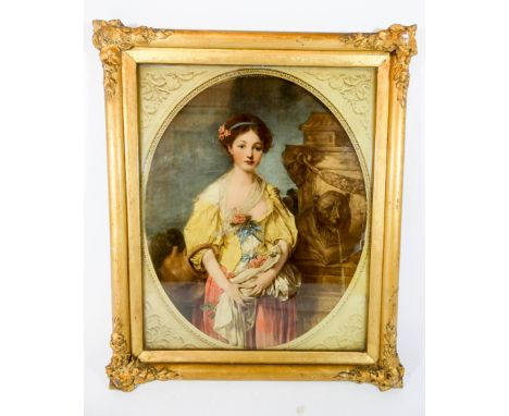 A gilt framed oval print of a young lady