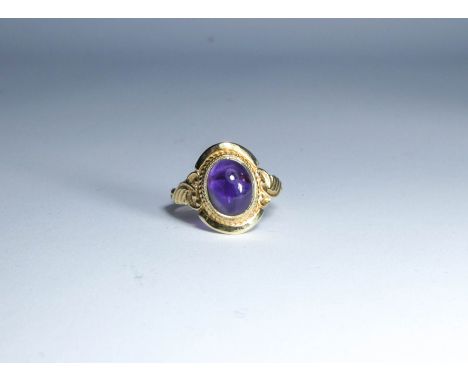 9ct yellow gold amethyst dress ring set with an oval cabochon amethyst in a oval wide setting ring size 'O'   