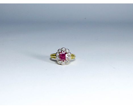 18ct yellow gold ruby and diamond oval cluster ring, ring size J