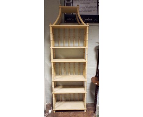 A Chinese design cream painted bamboo shelf unit with pagoda style top 28" wide  Approx 83 inches tall