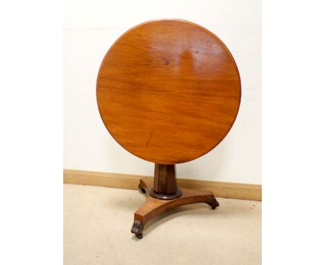 A circular Victorian mahogany snap top occasional or centre table on pillar with triple platform base