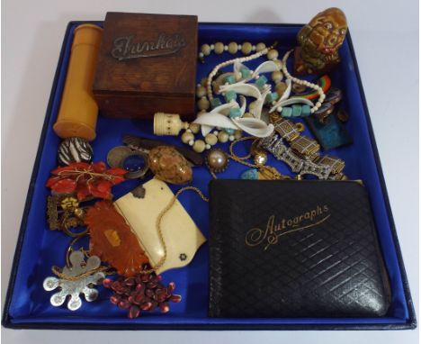 A tray of collectables to include old autograph album, amber brooch, silver mounted trinket box, jewellery etc 