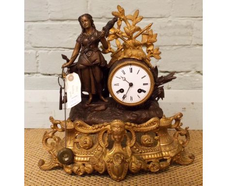 A French spelter and gilt figure mounted striking mantle clock 14" high 