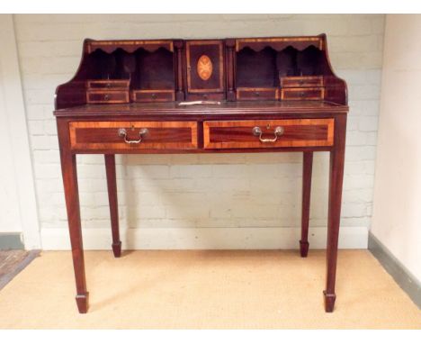 Edwardian style inlaid and cross banded mahogany Carlton House style desk, the back fitted with drawers and small cupboard, t