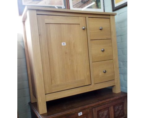 A modern light oak finish sideboard fitted cupboard and three drawers 2'9 wide 