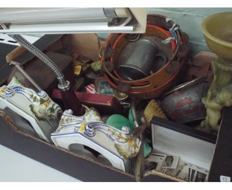 Desk lamp, badges, tambourines, biscuit tin and various other sundries 