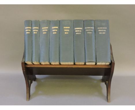 A set of eight bound volumes of Aldeburgh Festival 1948-1987, in a book shelf