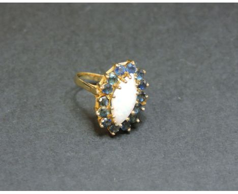 A 9ct gold marquise shaped opal and sapphire cluster ring