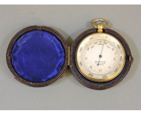 A gilt metal pocket barometer, the silver dial for Chadburns Ltd, 47 Castle Street, Liverpool, in red leather travel case