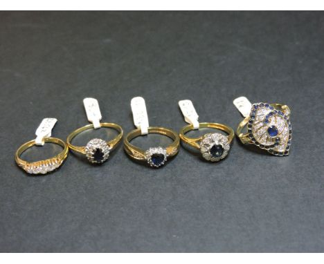 A 14ct gold sapphire and diamond marquise shaped cluster ring, two 18ct gold sapphire and diamond cluster rings, a 9ct gold h