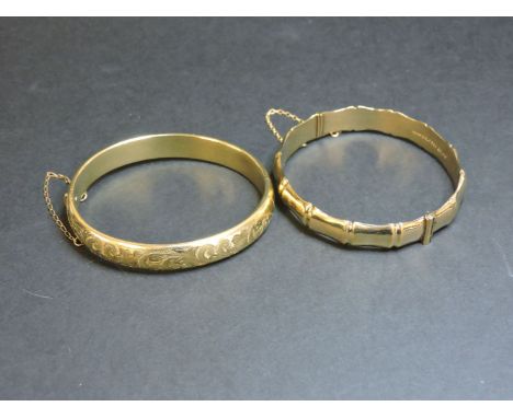 A 9ct gold hollow hinged bamboo bangle, and a 9ct gold hollow hinged bangle with engraved decoration