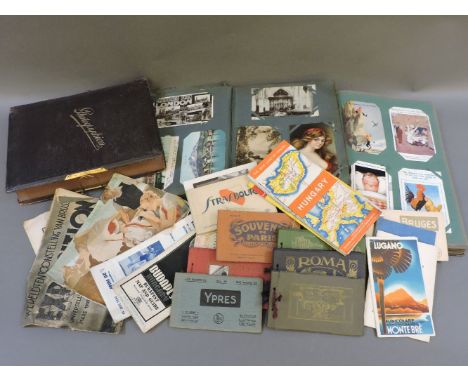 Two postcard albums, mostly containing topographical scenes, Nottingham, Skegness, Blackpool, humour cards, other loose cards