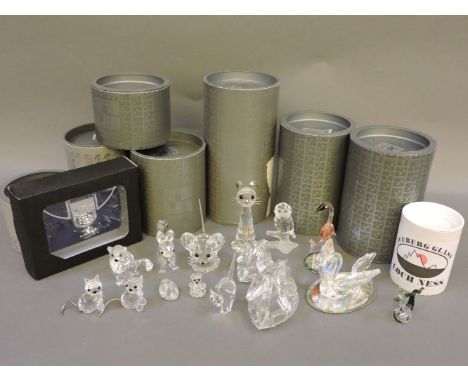 Ten Swarovski crystal animals, a Swarovski compact, and other glass animals
