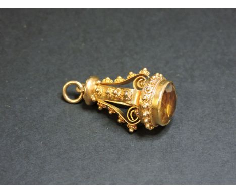 An Italian lantern style pendant, circa 1960, rub set with a cairngorm, tested as a18ct gold approximately