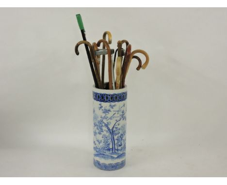 A Chinese blue and white stick stand, and sticks, 61cm highProvenance: from the Estate of Lady Barbara Calcutt