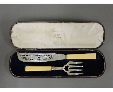 A cased pair of fish servers, with silver blades, Sheffield 1846