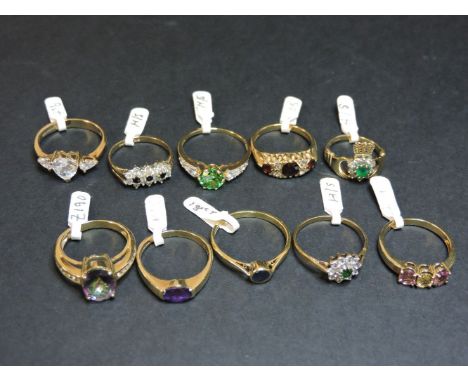 Ten rings, to include a 9ct gold sapphire and cubic zirconia ring, a 9ct gold amethyst ring, a 9ct gold mystic topaz ring, a 