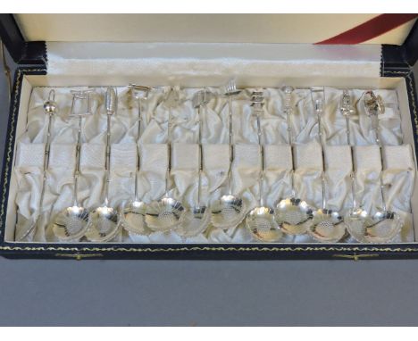 A set of twelve Chinese sterling 950 stamped spoons, each with different terminals, a kettle, gate, lantern, pagoda, etc, 10.