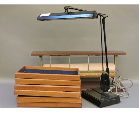 An oak wrapping paper dispenser, 78cm long, an anglepoise lamp, and six jewellery trays