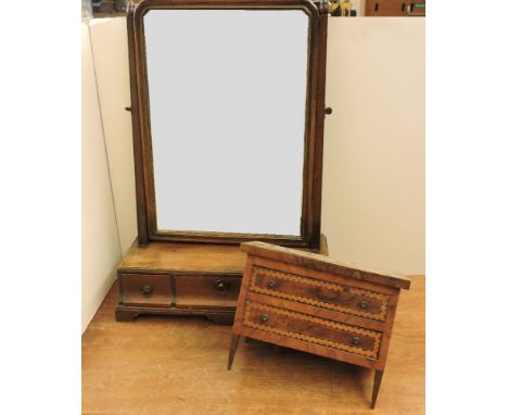 A George III walnut dressing mirror, with box drawer base, and a miniature French marquetry commode, a/f, 23cm high
