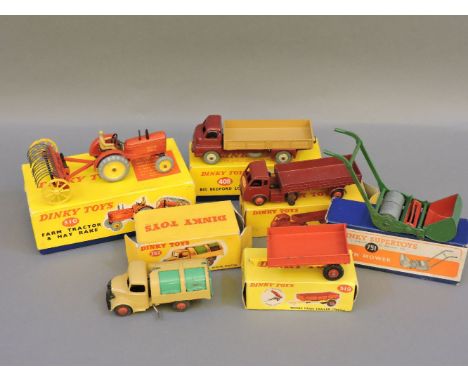 Dinky toys, lawn mower 751, British Railways electric articulated lorry 421, Week's Farm trailer tipping 319, farm tractor an