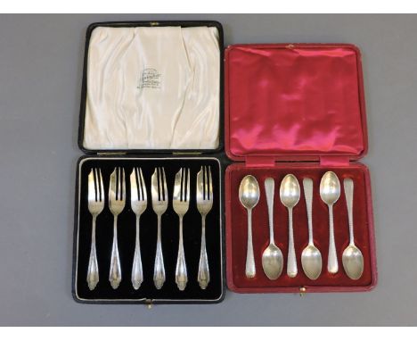 A cased set of six silver gateau forks, Sheffield 1925, a cased set of six silver coffee spoons, Sheffield 1911Provenance: fr