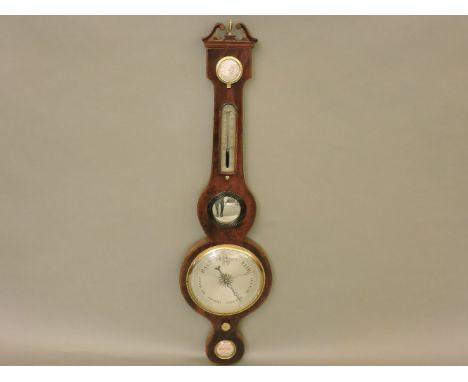 A 19th century mahogany wheel barometer, with a silvered hygrometer thermometer, level, and a convex mirror, 98cm high