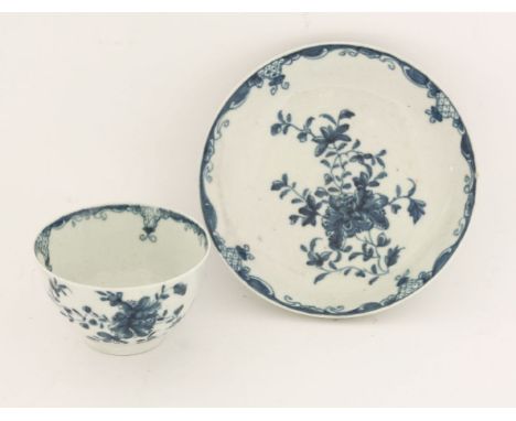 A Worcester blue and white Tea Bowl and Saucer,c.1775-1780, painted in the 'Mansfield' pattern, within a No. 29 border, workm