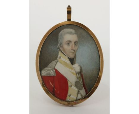 English School, late 18th centuryPORTRAIT OF AN OFFICER, HALF LENGTH IN UNIFORMMiniature on ivory70 x 54mm, in a gilt metal f