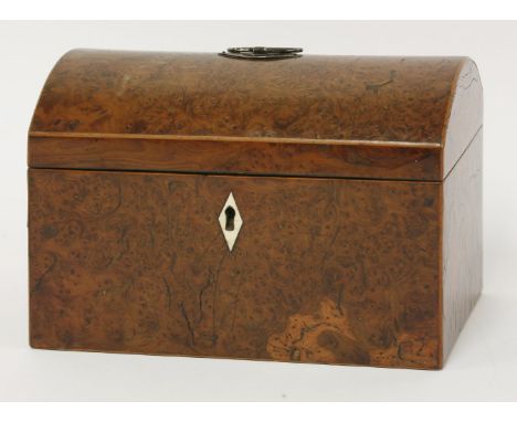 An unusual burr yew wood domed top tea caddy,early 19th century, the interior with a single lidded compartment and a glass mi