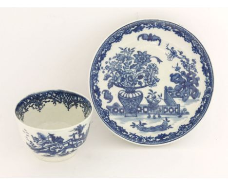 A Worcester blue and white Tea Bowl and Saucer,c.1780, printed in 'The Bat' pattern, disguised numeral mark, saucer 12.3cm di