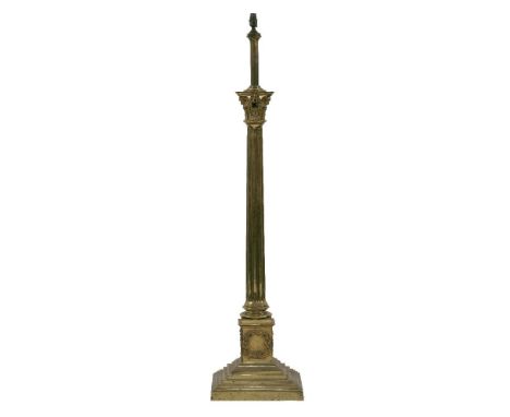 A good brass standard lamp,with an adjustable centre light on a boldly cast fluted column, with an acanthus leaf capital and 