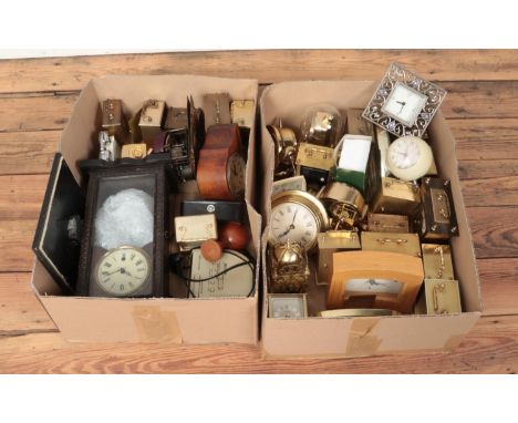 Two boxes of clocks. Includes quartz carriage clocks, wall clock, alarm clocks etc.  