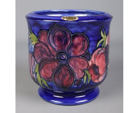 A large Moorcroft pottery planter decorated in the Anemone design. Height 17.5cm, Diameter 18cm.  