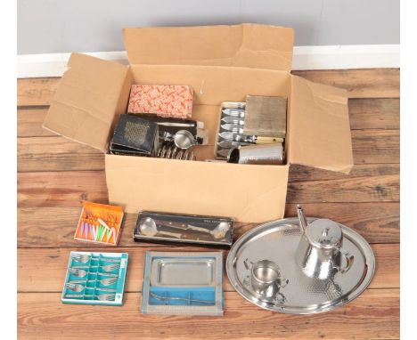 A quantity of stainless steel metal wares to include cutlery, tray and tea service.  