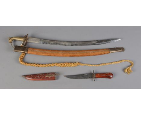 A 20th century Indian dress sword with scabbard along with similar knife example. CANNOT POST OVERSEAS  