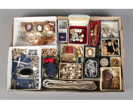 A large tray of costume jewellery, to include cameo examples, manual wind wristwatch, large pendants and brooches.  