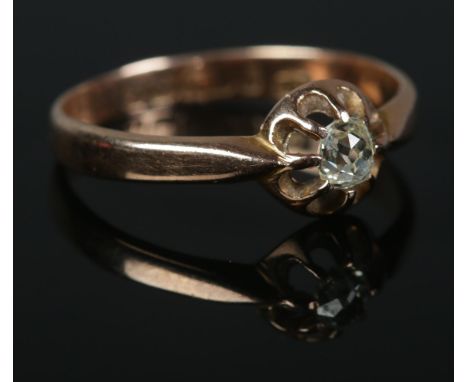 A 9ct Rose Gold old cut diamond solitaire ring. Assayed for Birmingham 1916. Size RÂ½. Total weight: 1.9g.  Stone good. One s