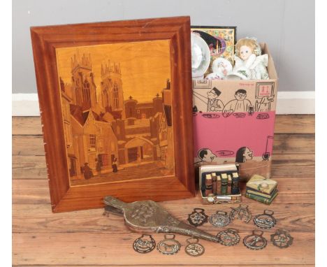 A quantity of assorted items, to include wooden plaque, ceramic bells and horse brasses.  