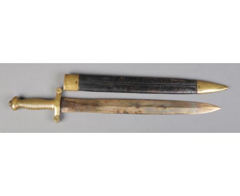 A French 1831 model short sword with brass and leather scabbard. Bearing anchor mark to cross guard, possibly signifying nava