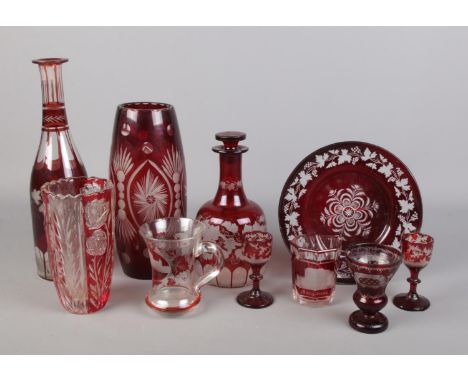 A quantity of cut and etched ruby glassware, to include large vase, decanter and dish.  One stopper missing from one decanter
