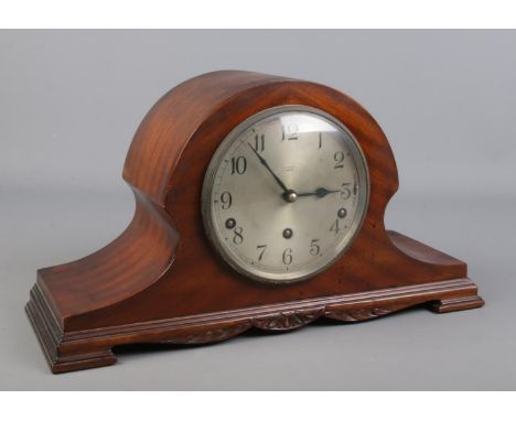 A mahogany cased Garrard mantel clock. The dial marked for R A Miles, London.  