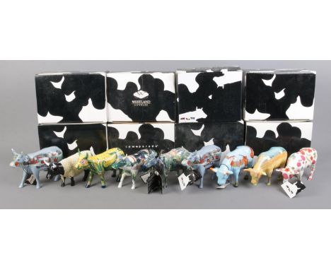 A collection of nine Cow Parade ceramic cows, eight boxed. To include Vinvent Van Cogh, Cow in Sheep's Clothing, Lowry Cow an