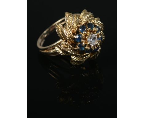 A vintage 9ct Gold and Sapphire cluster floral cocktail ring. Assayed for London 1968. Size KÂ½. Total weight: 5.6g  