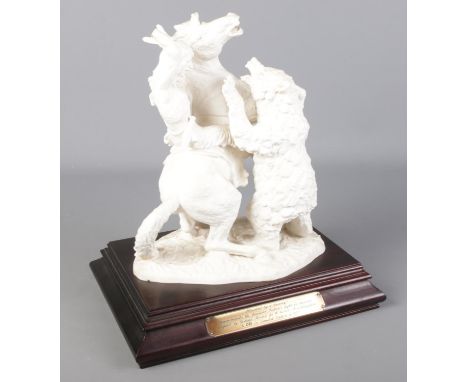 A Goebel figure group titled "Attacked By a Grizzly".  